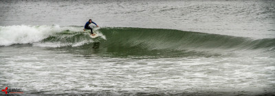 A lone surfer ant Buffalo Bay.