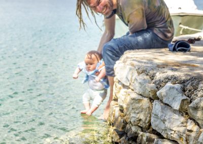 Man and baby taking a swim